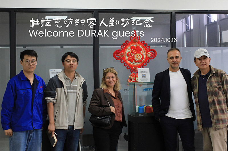 Suzhou Nett New Material Technology Co., Ltd. Bienvenida al cliente turco Durak Tekstil para una visita estratégica